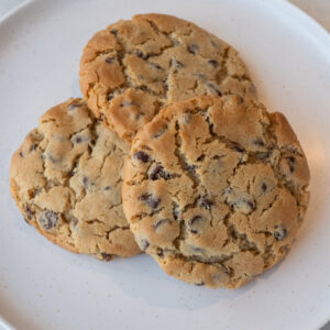 Our house classic chocolate chip cookies are unforgettable. Belgian chocolate chips are mixed throughout the cookie dough, which comprises both turbinado and brown sugars. These give the baked cookie the perfect texture. Baked crispy on the outside and soft and chewy on the inside.