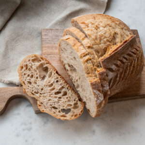 Our sourdough spelt loaf is made with 100% organic spelt flour, bread flour, water, and salt. We give our dough a slow-ferment to provide the optimal flavor profile. Baked fresh daily, these loaves have a chewy crust with a light and open crumb.